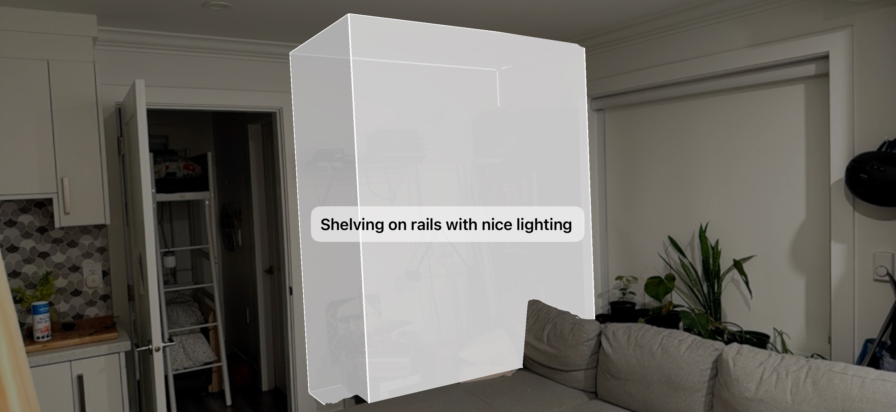 AR view of the same wall with a 3D bounding box drawn in front of it, labeled 'Shelving on rails with nice lighting'.